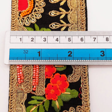 Black Art Silk Fabric Trim With Green, Orange, Red And Gold Floral Embroidery